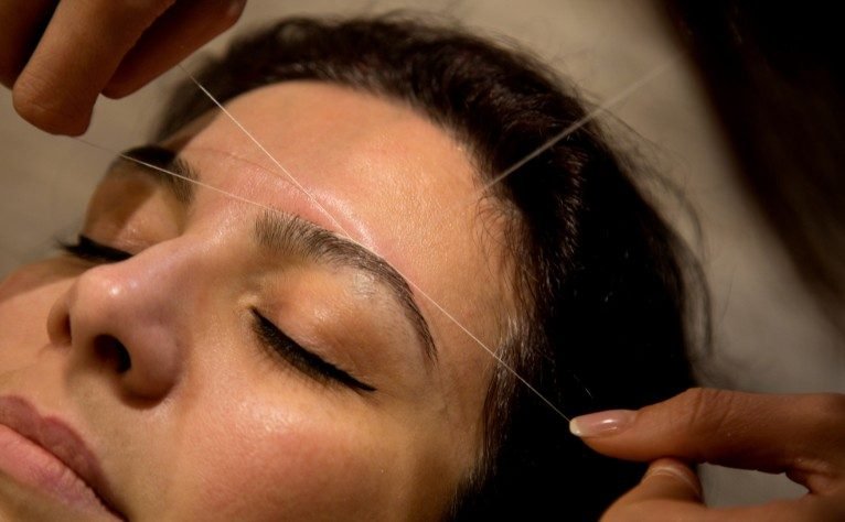 Eyebrow Threading woman