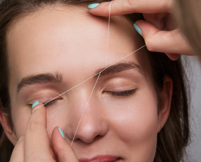 Eyebrow Threading of an woman